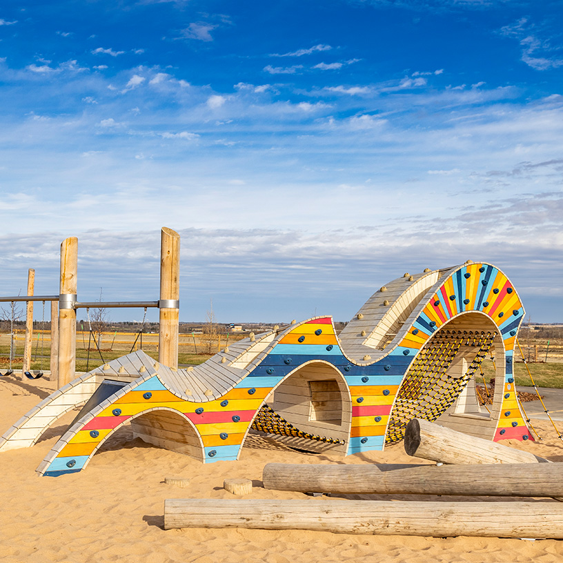 Cambrian community playground with lots of vibrant colours.