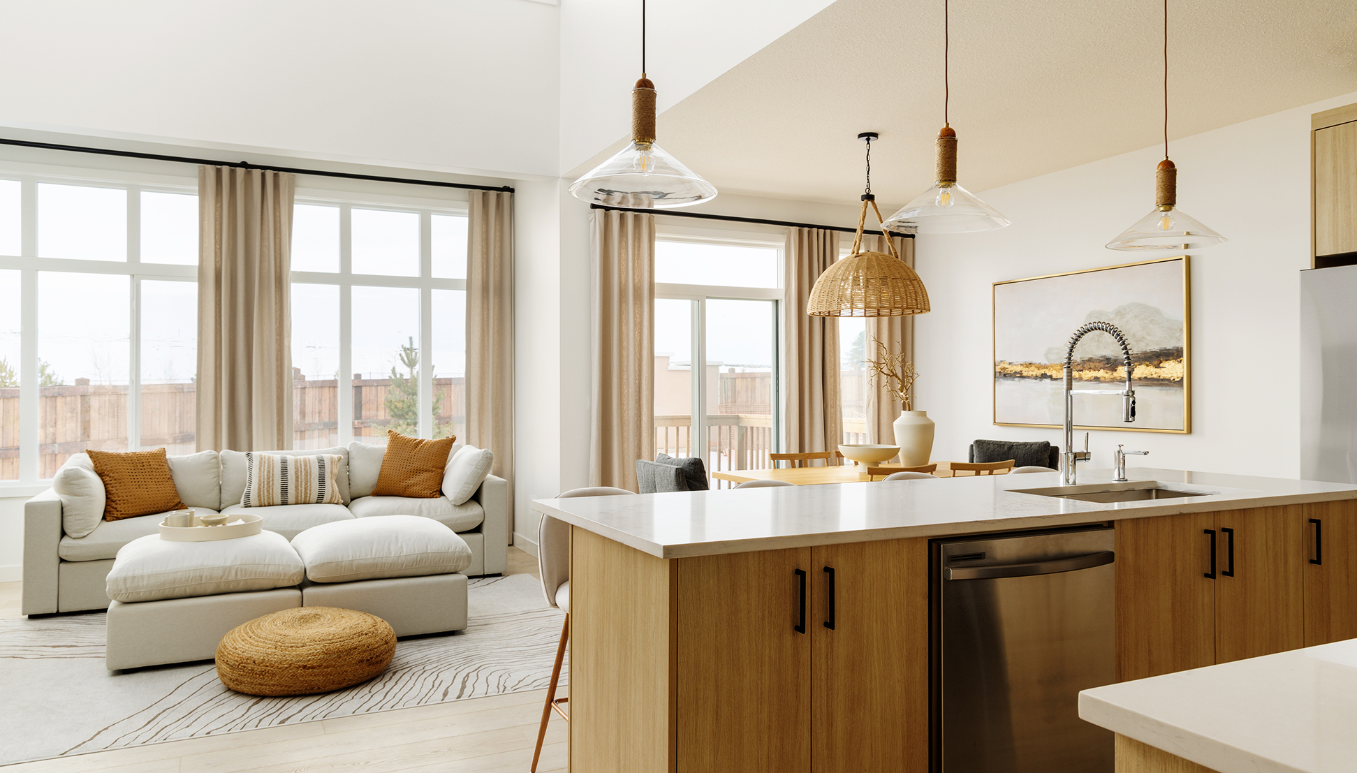 Interior photo of kitchen island with living room behind.